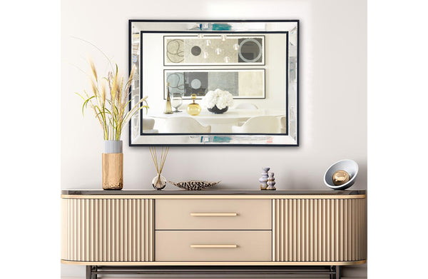 Small black beaded framed mirror displayed above buffet cabinet in dining area.