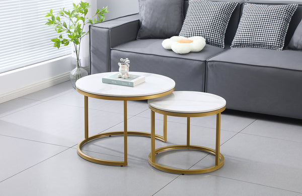 Romana nesting coffee tables with gold frame and marble tops, displayed in contemporary living space.