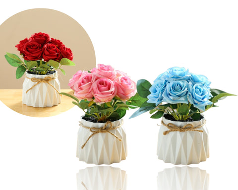 Set of three artificial rose arrangements in red, pink, and blue, each in a white geometric ceramic vase with rustic twine, 18cm height.