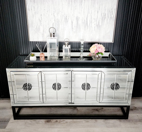 Athens mirrored sideboard styled with flowers, tray, and décor accessories, luxury modern furniture piece.