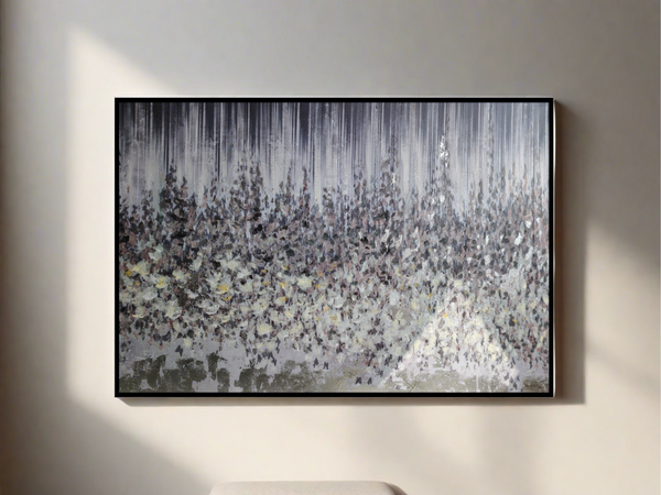 Large abstract autumn forest artwork with silver highlights, displayed in a black wood frame on a beige wall.