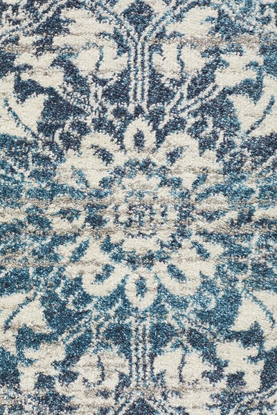 Detailed view of Babylon Blue Rug central floral medallion