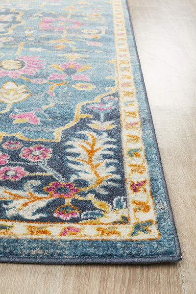 Edge view of Babylon Navy Rug showing colorful border
