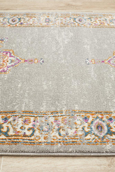 Close-up of Babylon Grey Rug border design highlighting the fine weave and vibrant colors.