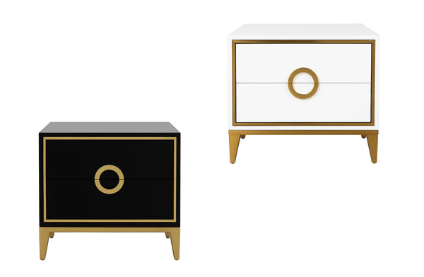 Balmain bedside tables in black and white finishes with gold trim and circular drawer handles.