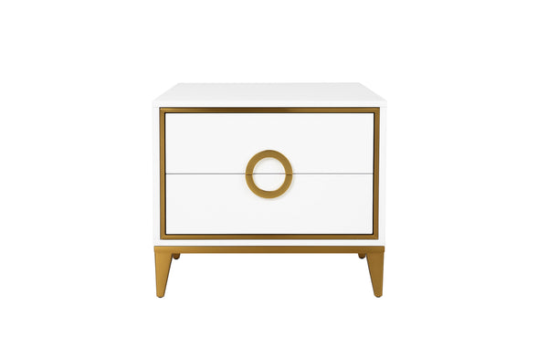 White Balmain bedside table with gold trim showcasing two drawers and signature circular gold handle.