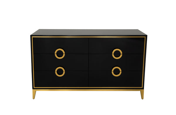 Balmain black dresser with gold trim featuring six drawers and circular handles in modern design.