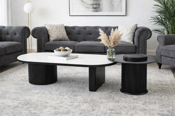 Brooklyn fluted coffee table set styled in living room with sofa and modern decor.