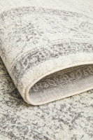Rolled edge of Century 977 Silver Rug highlighting fine weave and subtle silver pattern.