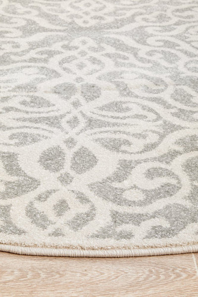 Close-up edge of round Chrome Lydia Silver Rug design