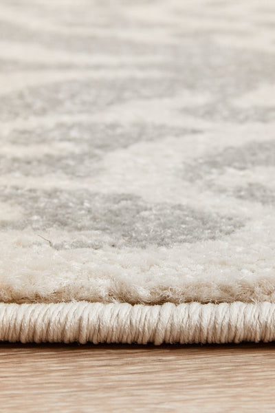 Side edge of Chrome Lydia Silver Rug showing plush pile