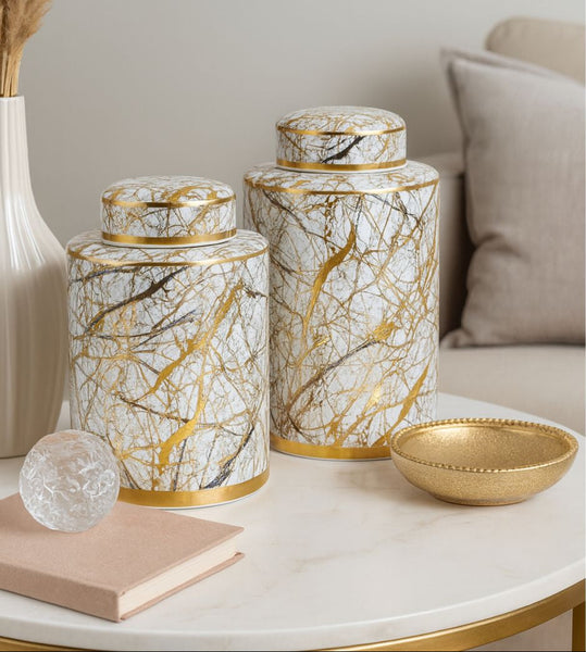Decorative jars with marble pattern on a table