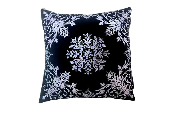 Luxurious black velvet cushion with intricate white damask design, adding style and modern charm.