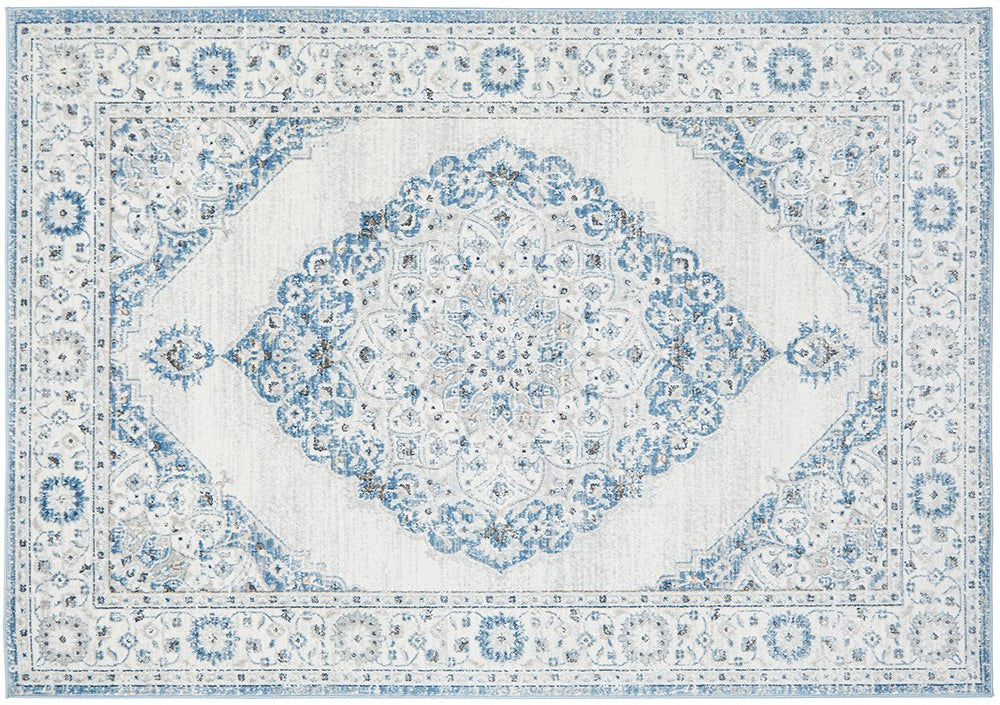 Flat lay of Emotion 77 Blue Rug with intricate medallion design