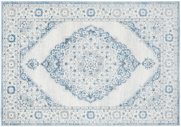 Flat lay of Emotion 77 Blue Rug with intricate medallion design