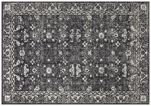 Flatley view of elegant charcoal rug with detailed patterns for a modern touch.