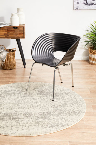 Round white silver rug in contemporary home office setting