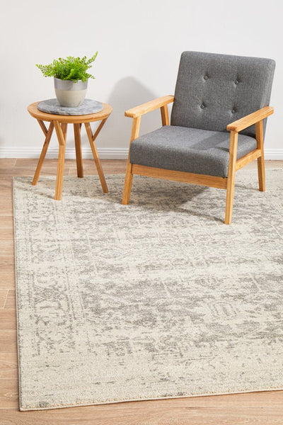 Elegant rectangular white silver rug in modern lounge setting