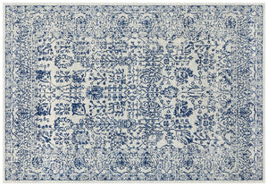 Traditional ivory rug with navy distressed floral motifs, perfect statement piece for classic home interiors.