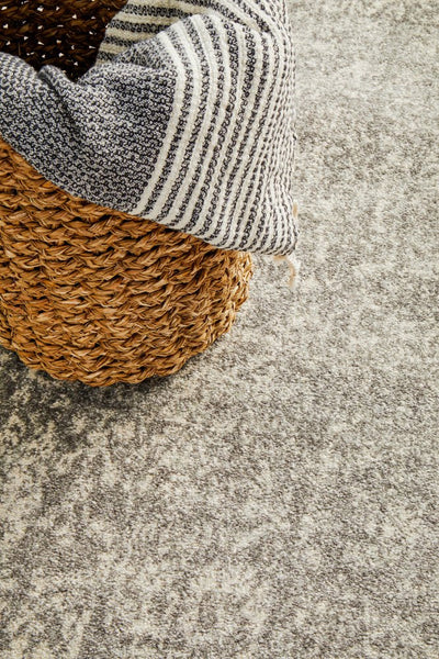 Close-up view of the Evoke 256 Grey rug’s soft textured weave with neutral tones