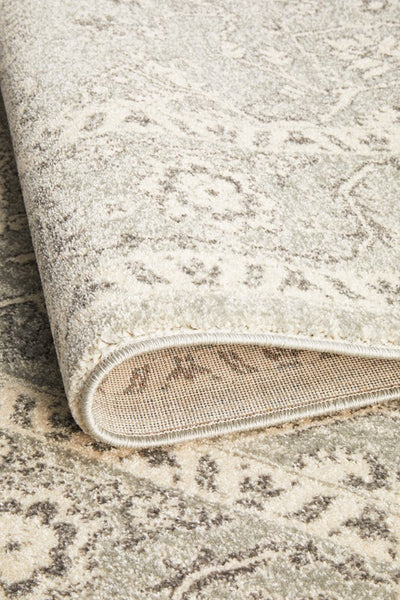 Folded edge view highlighting thick rug pile, soft texture, and durable polypropylene weaving.