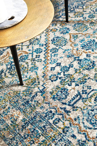 Detailed view of Evoke 263 Silver Rug pattern with blue, gold, and silver tones