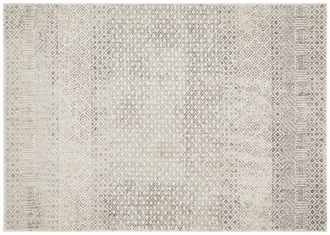 Evoke 265 Grey Rug flatlay showing full geometric distressed pattern in silver and grey.