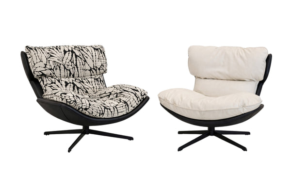 Enzo swivel arm chair shown in black and white fabric and cream vegan leather colour options side by side.