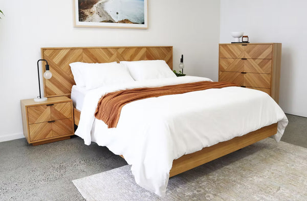 Esta herringbone bedroom set featuring messmate timber bed frame, bedside tables and tallboy in natural finish.
