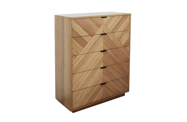 Esta herringbone floating tallboy crafted from solid messmate timber featuring five spacious drawers and geometric pattern.
