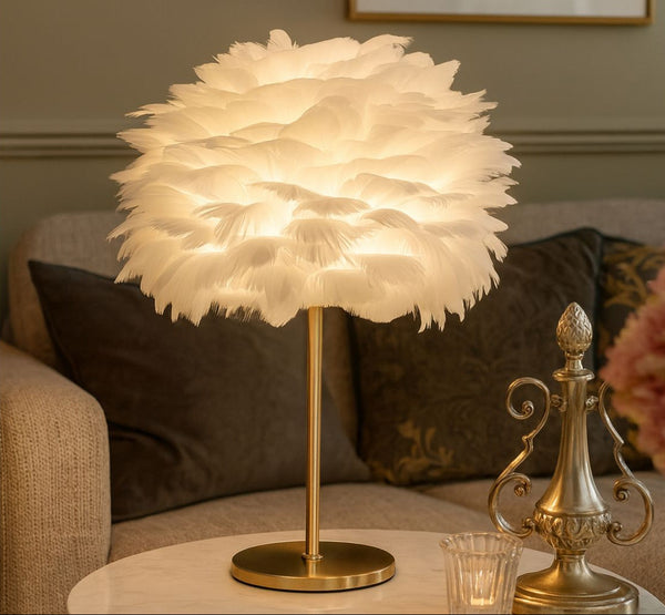 Feathered table lamp on a side table with a cozy living room background