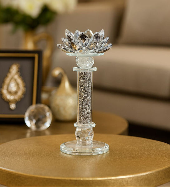 Decorative crystal candle holder on a table with a blurred background