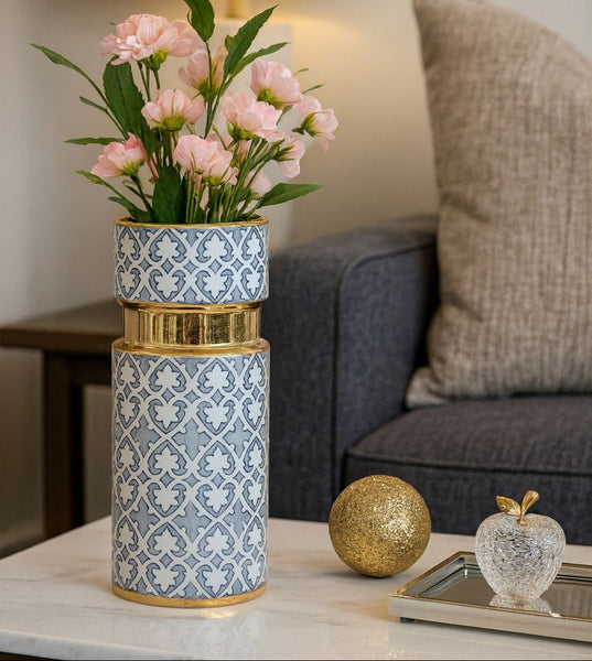 Decorative vase with floral arrangement on a table in a living room setting