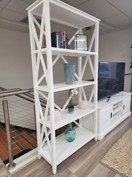 Hampton's Style Bookcase styled in a living space with decorative vases and books – elegant 4-shelf white display unit for home or office