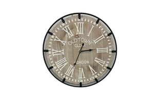 Natural industrial style wall clock with Roman numerals, bold decorative timepiece for interiors.