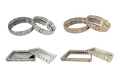  Katie tray set of 2 in round and rectangle styles, available in gold and silver finishes with mirrored bases, perfect for serving or décor.