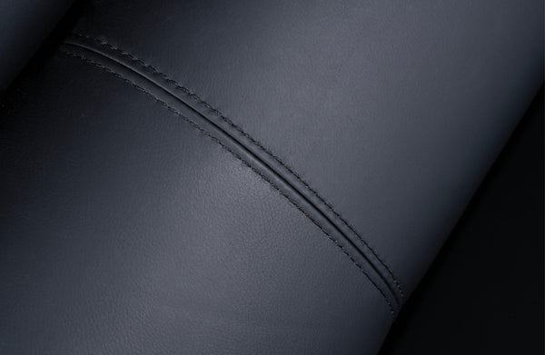 Close-up view of Lawson black leather sofa showcasing fine stitching detail and smooth premium upholstery.