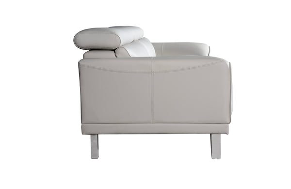 Side view of Lawson light grey leather sofa featuring adjustable headrest and stainless steel legs.