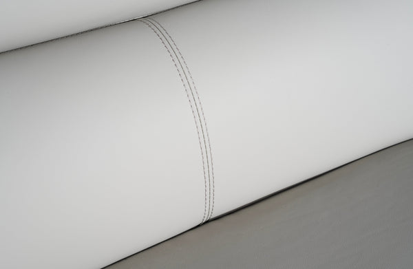 Close-up view of Lawson light grey leather sofa showing fine stitching detail and smooth upholstery.