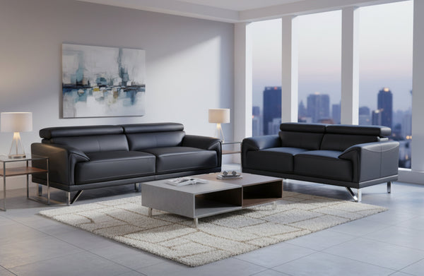 Lawson black leather 3-seater and 2-seater sofas styled in a modern living room with city views.
