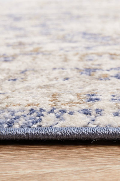 Side edge view of Mayfair Hugo Ocean Rug showing soft pile