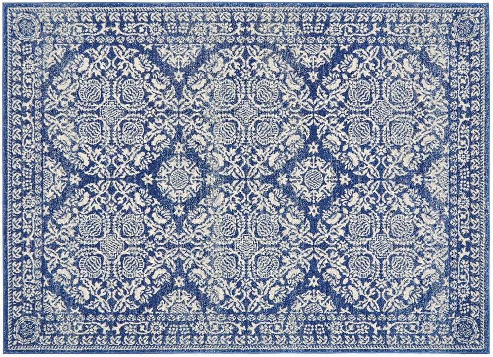 Flat lay of Mirage 358 Navy Rug with ornate floral motifs