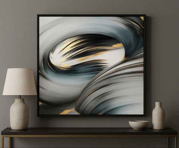 Abstract art piece on a wall above a console table with decorative items.
