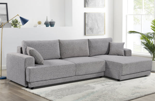 Sculpted grey Nora sectional with oversized chaise – effortlessly stylish with deep seats, clean lines, and high-end comfort