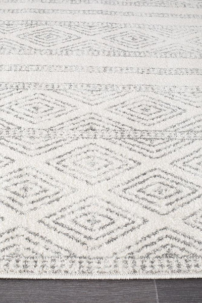 Close-up of the Oasis 450 Grey Rug texture, highlighting the plush grey diamond and stripe pattern.