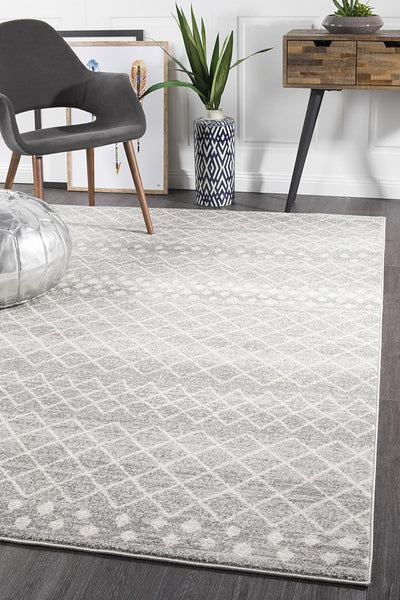 Oasis 454 Silver Rug styled in modern living room with grey chair
