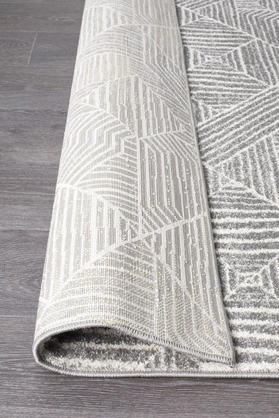 Folded corner of Oasis Silver Rug showing fine weave
