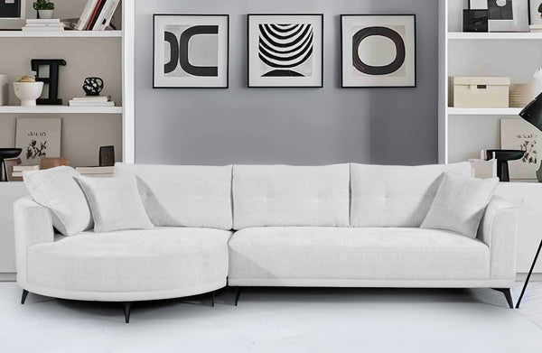 Savannah Round Chaise Lounge Set in Beige– Chic modern curved chaise and sofa duo styled in a minimalist space with bold black-and-white art.