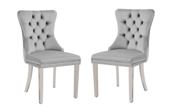 Alsea light grey velvet dining chair with tufted back, stud trim, ring handle, and silver legs.