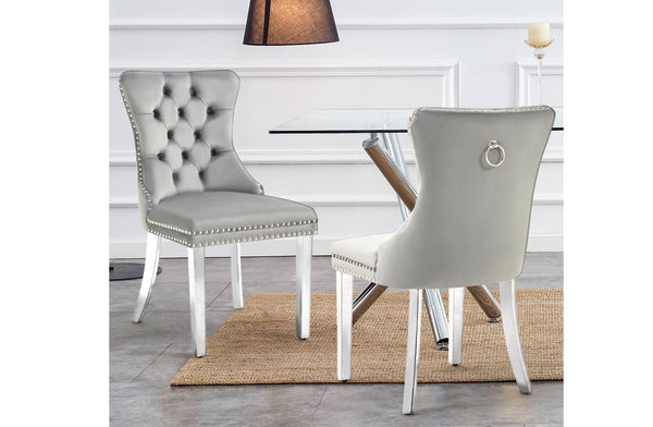 Alsea light grey velvet dining chairs with silver legs styled beautifully in a dining room